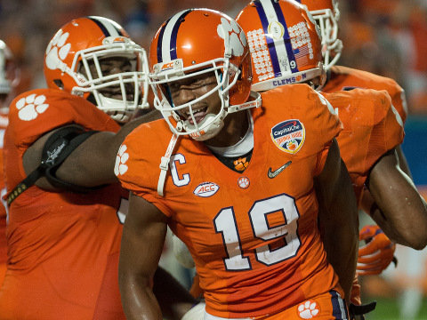 Clemson Tigers wide receiver Charone Peake (19) celebrates with teammates after a touchdown scored by Clemson Tigers running back Wayne Gallman (9) in action during the College Football Playoff Semifinal - Orange Bowl Game between the Oklahoma Sooners and the Clemson Tigers at Sun Life Stadium, in Miami Gardens, FL, December 31. 2015 (Credit: Icon Sportswire/Robin Alam)