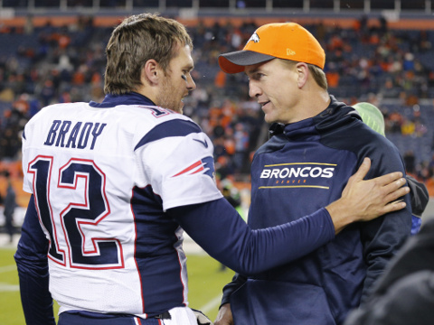 New England Patriots quarterback Tom Brady (12) shakes hands with Denver Broncos quarterback Peyton Manning (18) before the NFL regular season game, Denver, Colorado, November 29, 2015 (Credit: AP/Ric Tapia)