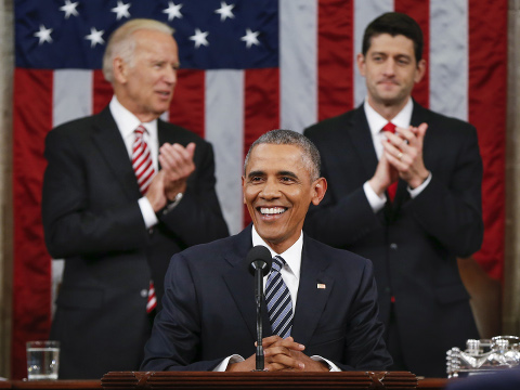 Vice President Joe Biden, left, and House Speaker Paul Ryan of Wisconsin applaud President Barack Obama during the State of the Union address before a joint session of Congress on Capitol Hill in Washington, January 12, 2016 (Credit: AP Images/Evan Vucci)