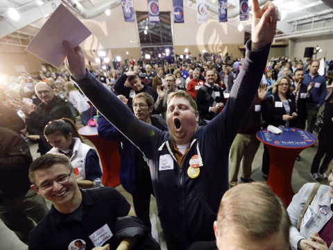 Josh Kent celebrates at Republican presidential candidate, Senator Ted Cruz, R-Texas, caucus night rally, Des Moines, Iowa, February 1, 2016 (AP Photo/Charlie Neibergall)