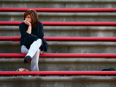 Lonely girl (Credit: Tom Woodward via Flickr)