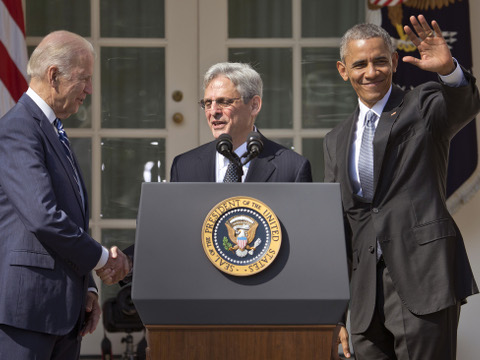 Federal appeals court judge Merrick Garland, center, stands with President Barack Obama and Vice President Joe Biden after being introduced as Obama's nominee for the Supreme Court during an announcement in the Rose Garden of the White House, in Washington, Wednesday, March 16, 2016. Garland, 63, is the chief judge for the United States Court of Appeals for the District of Columbia Circuit, a court whose influence over federal policy and national security matters has made it a proving ground for potential Supreme Court justices. (AP Photo/Pablo Martinez Monsivais)