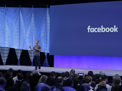 Facebook CEO Mark Zuckerberg during the keynote address at the F8 Facebook Developer Conference Tuesday, April 12, 2016, in San Francisco. Facebook says people who use its Messenger chat service will soon be able to order flowers, request news articles and talk with businesses by sending them direct text messages. At its annual conference for software developers, Zuckerberg said the company is releasing new tools that businesses can use to build