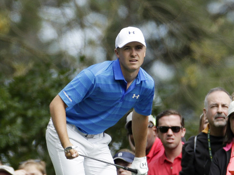 Jordan Spieth watches his tee shot on the fourth hole during the final round of the Masters golf tournament Sunday, April 10, 2016, in Augusta, Ga. (AP Photo/Charlie Riedel)