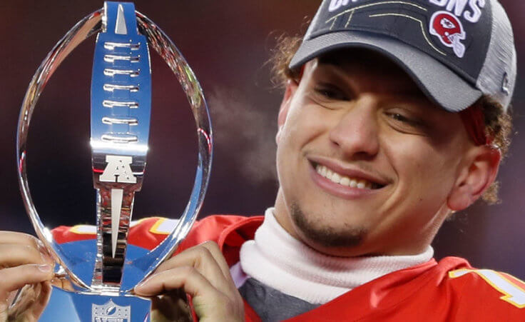 Kansas City Chiefs' Patrick Mahomes celebrates with the Lamar Hunt Trophy after the NFL AFC Championship football game against the Tennessee Titans Sunday, Jan. 19, 2020, in Kansas City, MO.