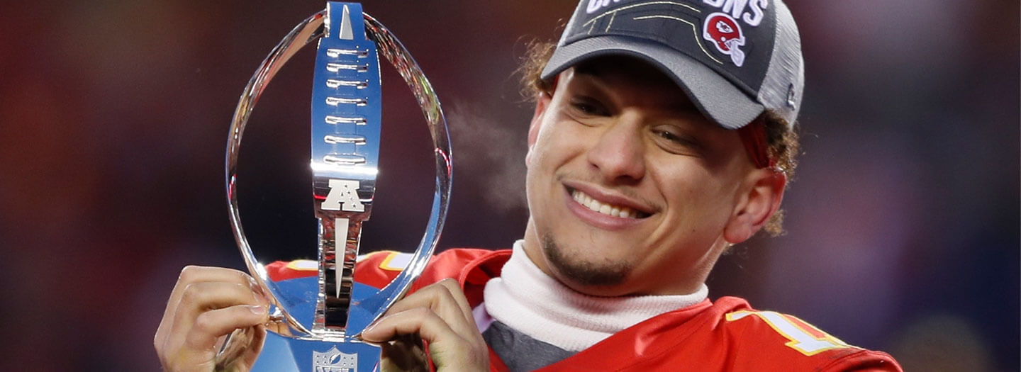 Kansas City Chiefs' Patrick Mahomes celebrates with the Lamar Hunt Trophy after the NFL AFC Championship football game against the Tennessee Titans Sunday, Jan. 19, 2020, in Kansas City, MO.