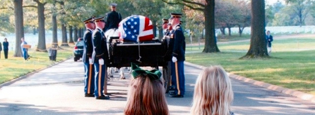 The youngest granddaughters of Col. Joseph Muckerman watch as the caisson carries their Pa-Joe to his final resting place in Section 60 at Arlington National Cemetery, Oct. 12, 2010. Col. Muckerman was a veteran of WWII, Korea and Vietnam (Credit: Anne Muckerman)