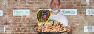 Joey Chestnut wins the Mustard Yellow Belt