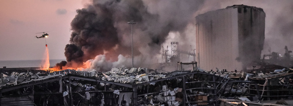 A military helicopter tries to put out a fire at the port after the explosion on August 4, 2020 in Beirut, Lebanon.