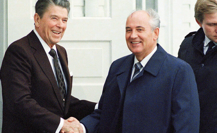 President Ronald Reagan shakes hands with Soviet Leader Mikhail Gorbachev