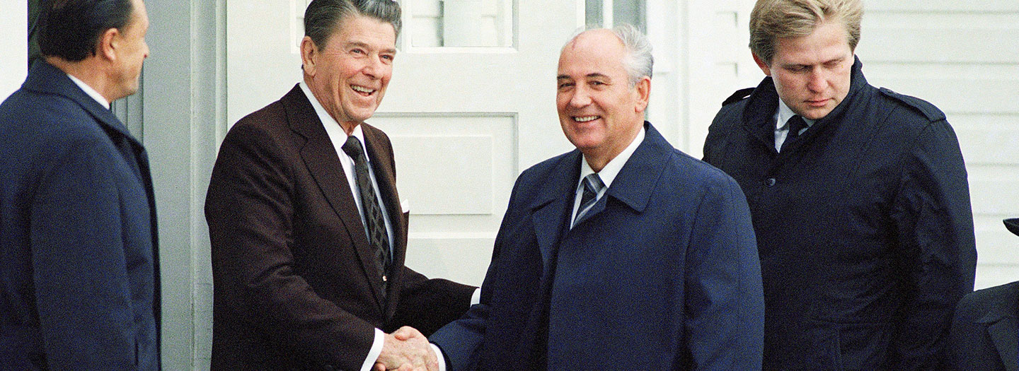President Ronald Reagan shakes hands with Soviet Leader Mikhail Gorbachev