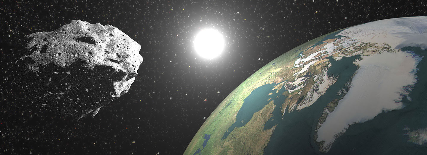 An asteroid floats near earth