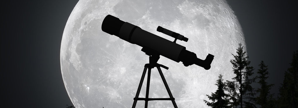 A large telescope sits in front of a much larger moon.