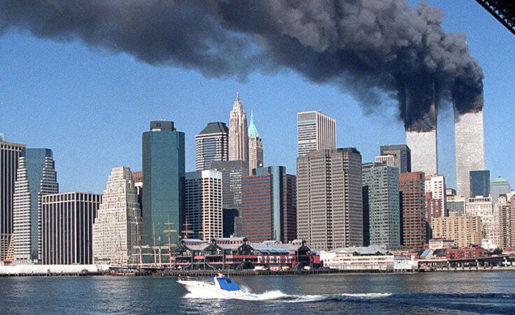 Smoke billows from the towers of the World Trade Center in New York, Tuesday, Sept. 11, 2001.