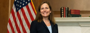 Supreme Court nominee Judge Amy Coney Barrett smiles during a meeting