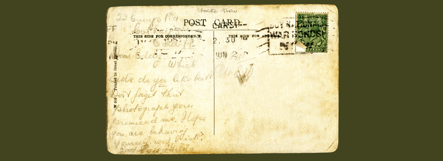 Woman receives a postcard from 1920: