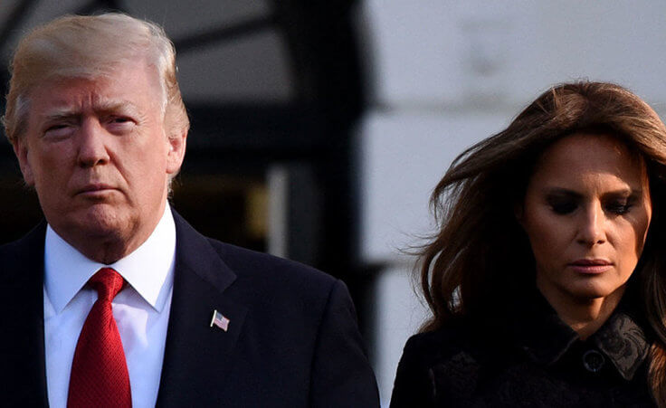 US President Donald Trump and First Lady Melania Trump joined by White House staff, participate in a moment of silence on the 16th anniversary of the September 11 terrorist attacks