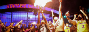 Los Angeles Lakers fans celebrate outside of Staples Center, Sunday, Oct. 11, 2020, in Los Angeles.