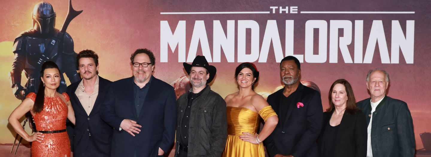 Ming-Na Wen, from left, Pedro Pascal, Jon Favreau, Dave Filoni, Gina Carano, Carl Weathers, Kathleen Kennedy, and Werner Herzog attend the LA Premiere of "The Mandalorian" at the El Capitan Theatre on Wednesday, Nov. 13, 2019, in Los Angeles.
