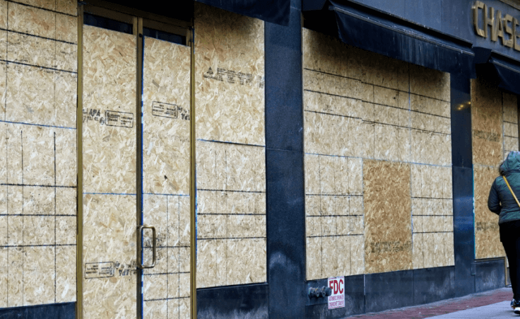 Boarding up businesses in case of riots