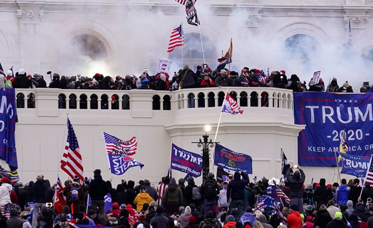 Violent protesters, loyal to President Donald Trump, storm the Capitol, Wednesday, Jan. 6, 2021, in Washington