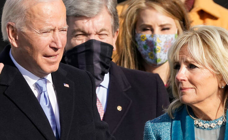 Joe Biden is sworn in as the 46th president of the United States by Chief Justice John Roberts as Jill Biden holds the Bible during the 59th Presidential Inauguration at the U.S. Capitol