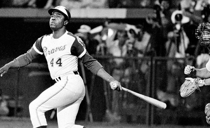Atlanta Braves' Hank Aaron watches the flight of his long ball to left field during a night game against the Los Angeles Dodgers in Atlanta, Ga., Wednesday, Sept. 26, 1973.