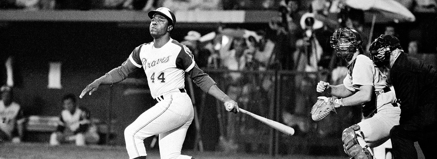 Atlanta Braves' Hank Aaron watches the flight of his long ball to left field during a night game against the Los Angeles Dodgers in Atlanta, Ga., Wednesday, Sept. 26, 1973.
