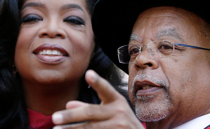 Prof. Henry Louis Gates points something out to Oprah Winfrey prior to her receiving an honorary degree from Harvard University