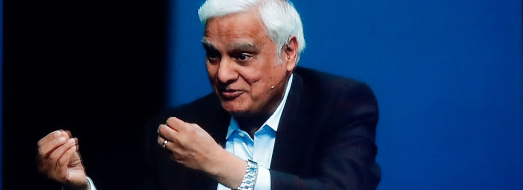 In this May 29, 2020 file photo, images of Ravi Zacharias are displayed in the Passion City Church during a memorial service for him in Atlanta.