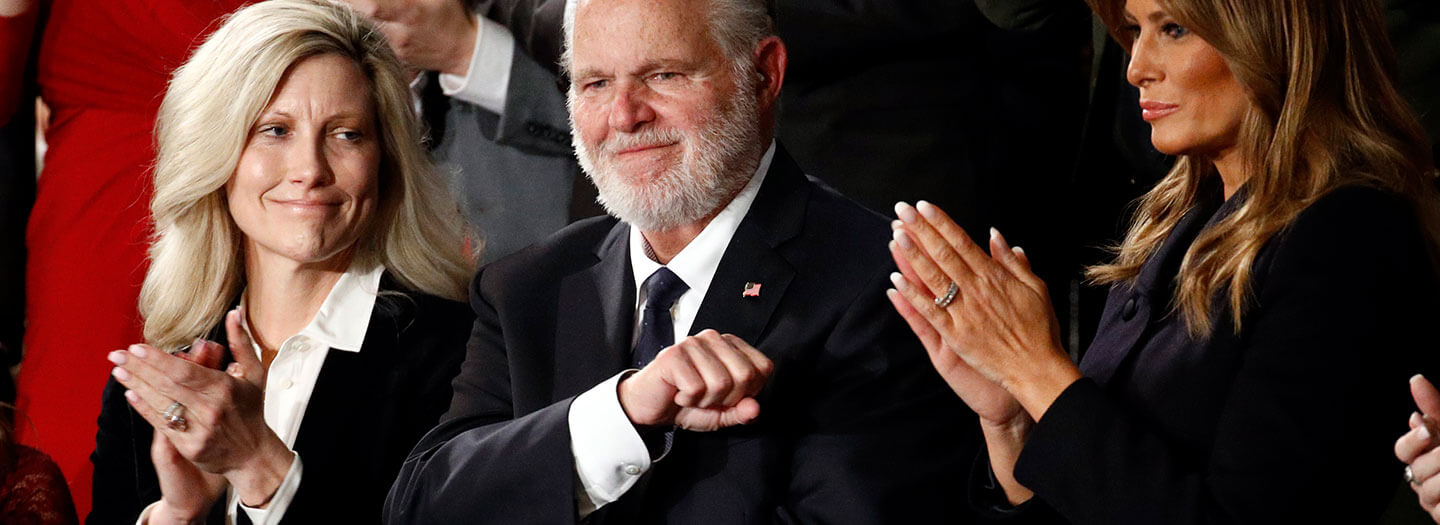 Rush Limbaugh reacts as first Lady Melania Trump, and his wife Kathryn, applaud, as President Donald Trump delivers his State of the Union address to a joint session of Congress on Capitol Hill in Washington.