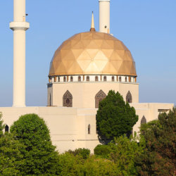 A mosque with a golden dome