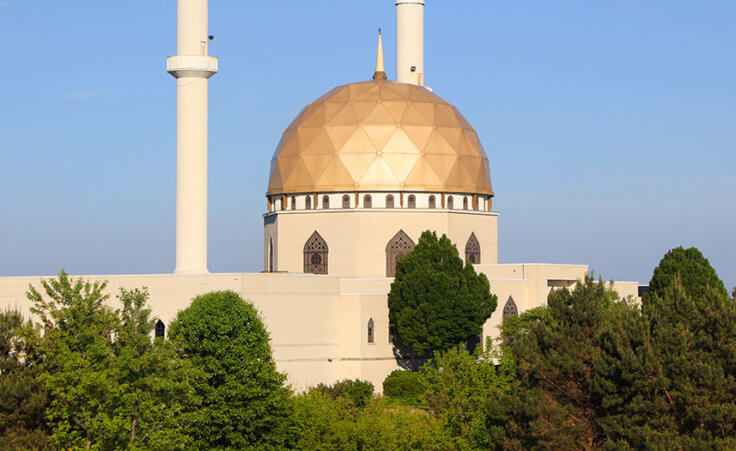 A mosque with a golden dome