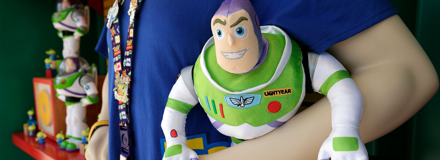 In this Saturday, June 23, 2018 photo, Buzz Lightyear dolls are among the merchandise items available to purchase at Toy Story Land in Disney's Hollywood Studios at Walt Disney World in Lake Buena Vista, Fla. (AP Photo/John Raoux)