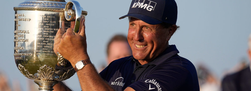 Phil Mickelson holds the Wanamaker Trophy after winning the PGA Championship golf tournament on the Ocean Course, Sunday, May 23, 2021, in Kiawah Island, S.C. (AP Photo/David J. Phillip)