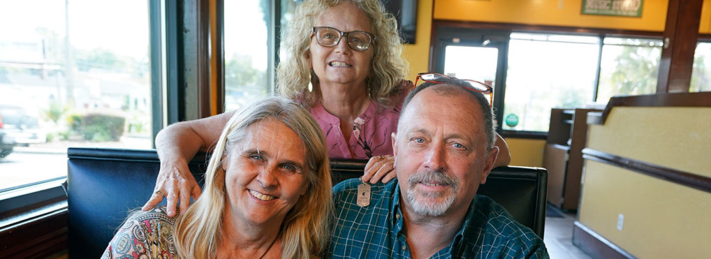 Two days after Debby-Neal Strickland, front left, and Jim Merthe were married in November, Debby donated a kidney to James' ex-wife Mylaen Merthe