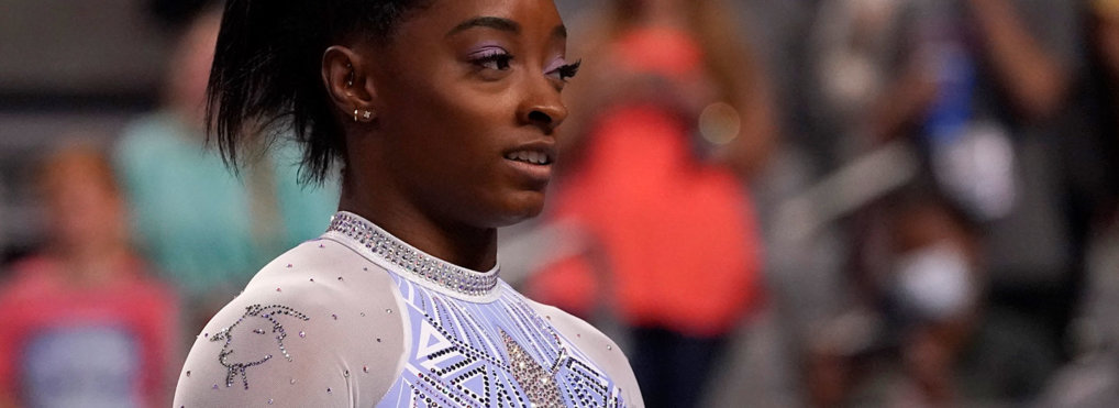 US gymnast Simone Biles wears a goat on her leotard's shoulder sleeve