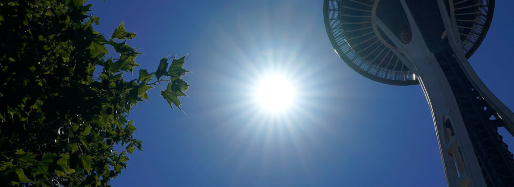 During the 2021 Pacific Northwest heat wave, the sun beats down over the Space Needle in Seattle, WA.