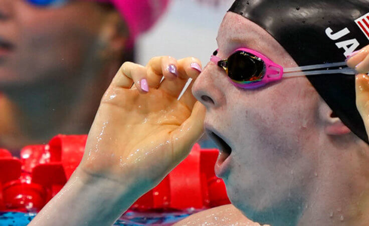 Lydia Jacoby of the United States, sees the results after winning the final of the women's 100-meter breaststroke at the 2020 Summer Olympics.