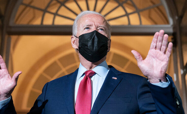 FILE - In this Oct. 1, 2021, file photo President Joe Biden speaks with reporters as he departs after a House Democratic Caucus meeting on Capitol Hill in Washington. (AP Photo/Alex Brandon, File)