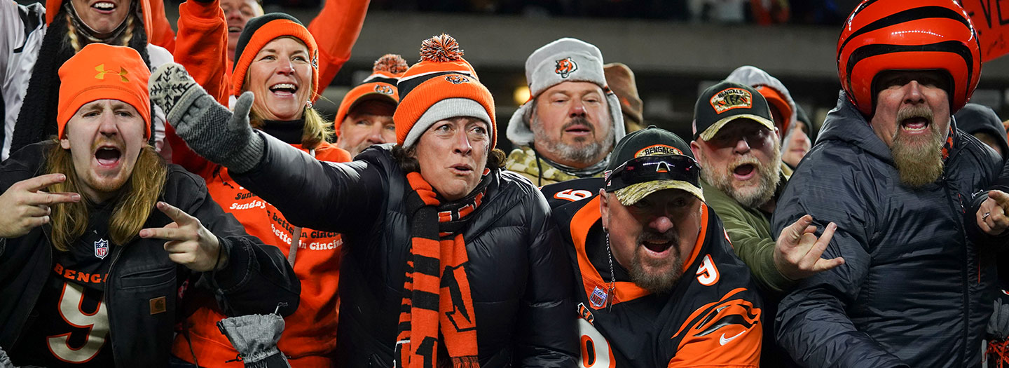 Cincinnati Bengals fans celebrate after winning an NFL wild-card playoff football game against the Las Vegas Raiders, Saturday, Jan. 15, 2022, in Cincinnati. (AP Photo/Jeff Dean)