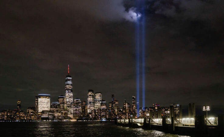 Twin beams of light commemorating the fallen twin towers of the World Trade Center are tested Wednesday night, Sept. 7, 2022, in New York City in advance of the 21st annual memorial of the Sept. 11 attacks. (AP Photo/J. David Ake)