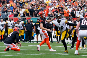 Cincinnati Bengals place kicker Evan McPherson, left, has an extra point blocked by Pittsburgh Steelers' Minkah Fitzpatrick during an NFL football game, Sunday, Sept. 11, 2022, in Cincinnati. (AP Photo/Jeff Dean)