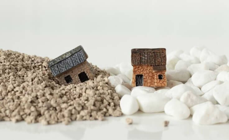 Miniature houses on sand and rocks, parable of Jesus
