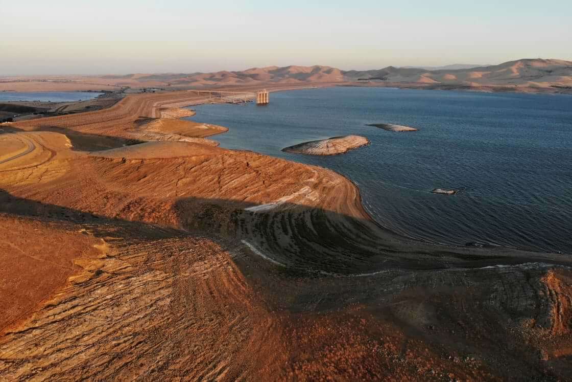 FILE - Water levels are low at San Luis Reservoir, which stores irrigation water for San Joaquin Valley farms, in Gustine, Calif., Sept. 14, 2022. The past three years have been California's driest on record and state officials said that they're preparing for the streak to continue. (AP Photo/Terry Chea, File)