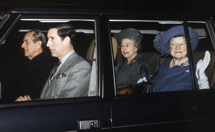 Members of the British Royal Family, from left to right: The Duke of Edinburgh, The Prince of Wales, Queen Elizabeth II and Queen Elizabeth, the Queen Mother ride by as they leave the wedding of Princess Anne to Commander Tim Laurence at a church near Balmoral, Scotland, Saturday, Dec. 12, 1992. (AP Photo//Press Association/Martin Keene)