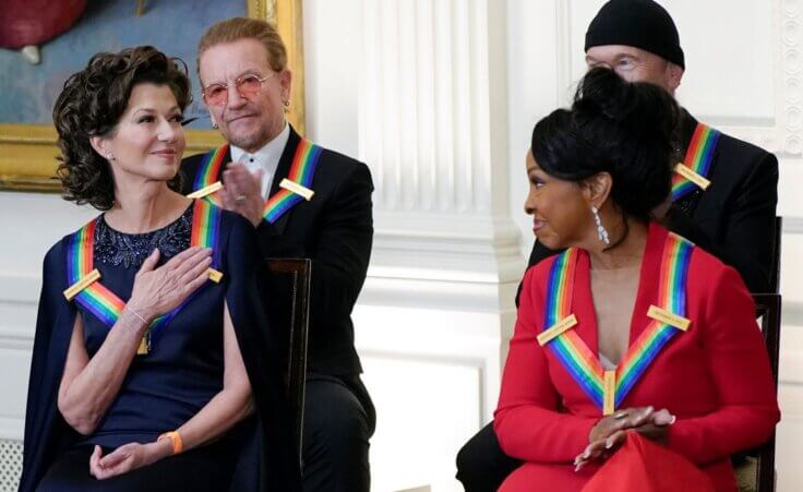 Contemporary Christian singer Amy Grant, left, reacts as she is recognized by President Joe Biden during the Kennedy Center honorees reception at the White House in Washington, Sunday, Dec. 4, 2022. The 2022 Kennedy Center Honorees are from left, Amy Grant, Bono, Gladys Knight, and The Edge. (AP Photo/Manuel Balce Ceneta)