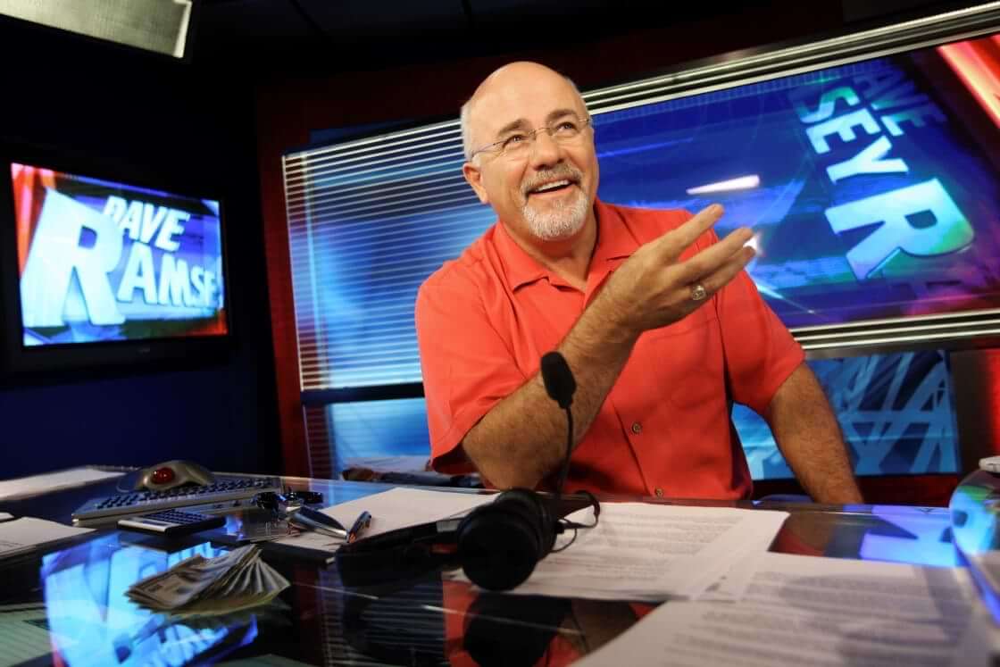FILE - In this July 29, 2009, file photo financial guru Dave Ramsey sits in his broadcasting studio in Brentwood, Tenn. (AP Photo/Josh Anderson, File)