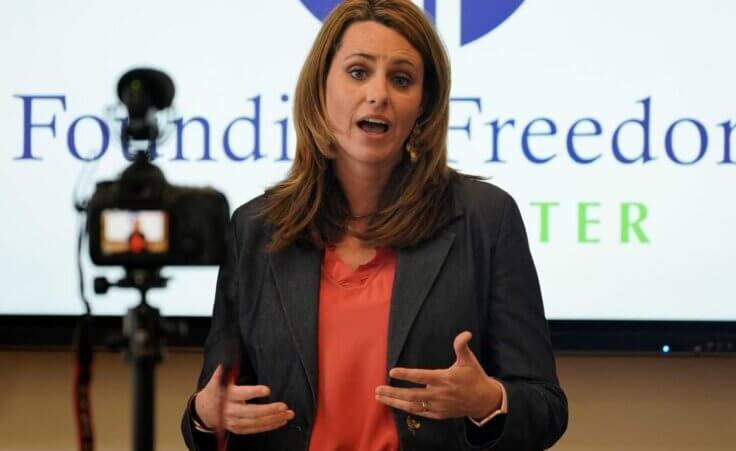 Victoria Cobb, of The Family Foundation, gestures during a news conference at the foundation offices in Richmond, Va., Tuesday, March 30, 2021. More recently, Cobb said her group was denied service at a restaurant for their biblical beliefs.