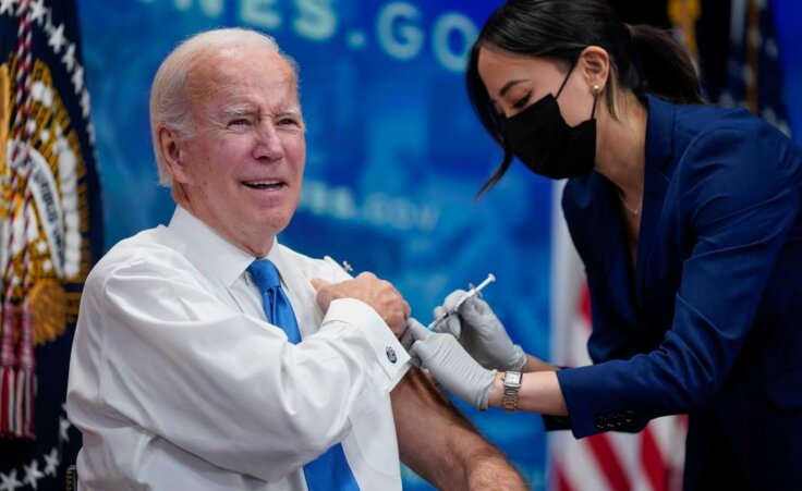 FILE - President Joe Biden receives his COVID-19 booster from a member of the White House medical unit during an event in the South Court Auditorium on the White House campus, Oct. 25, 2022, in Washington (AP Photo/Evan Vucci, File). On January 30, 2023, the White House announced that the US plans to end the coronavirus public health emergency on May 11.